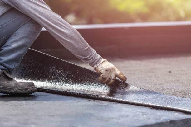 Professional Basement Waterproofing technician working in South Milwaukee, WI
